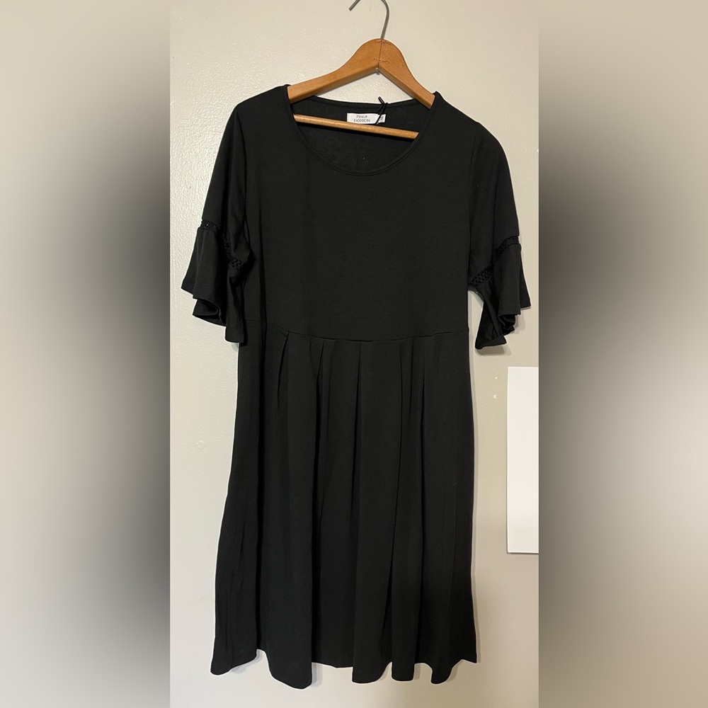 Little Black Dress, ruffled sleeves.